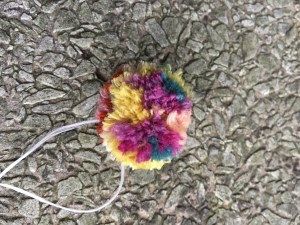 One side of multicolored pompom