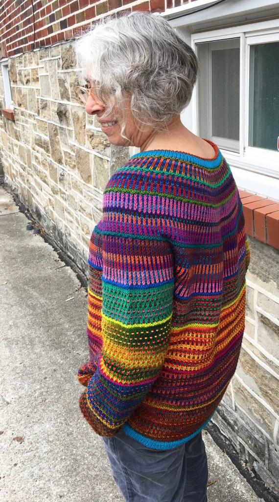 Reis pullover pattern knitted in Wollmeise DK multis and solids