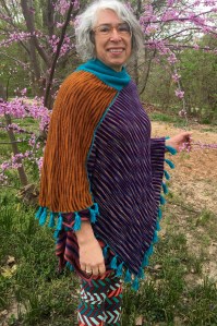 reverse face of double-sided machine-knit poncho