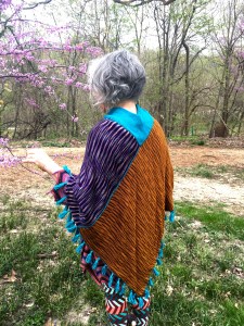 reverse face of double-sided machine-knit poncho, rear view