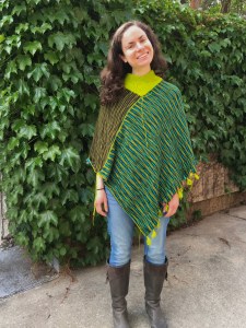 front view of one face of unfinished machine knit poncho