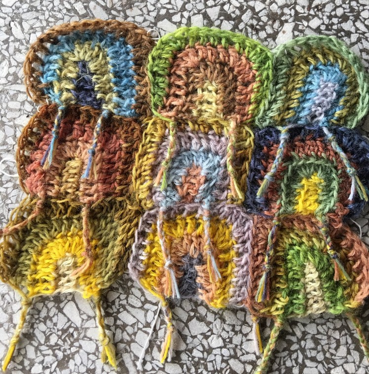 Crocheted motif in concentric "C" shape