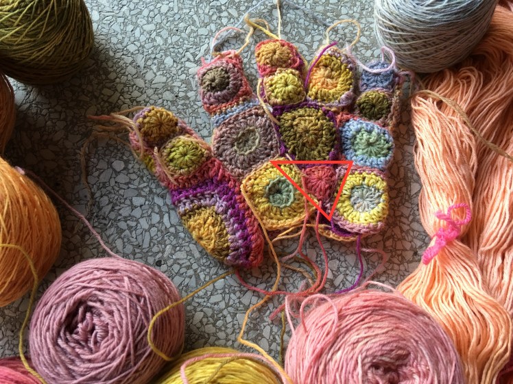 patchwork motifs shaping a glove to fit the hand