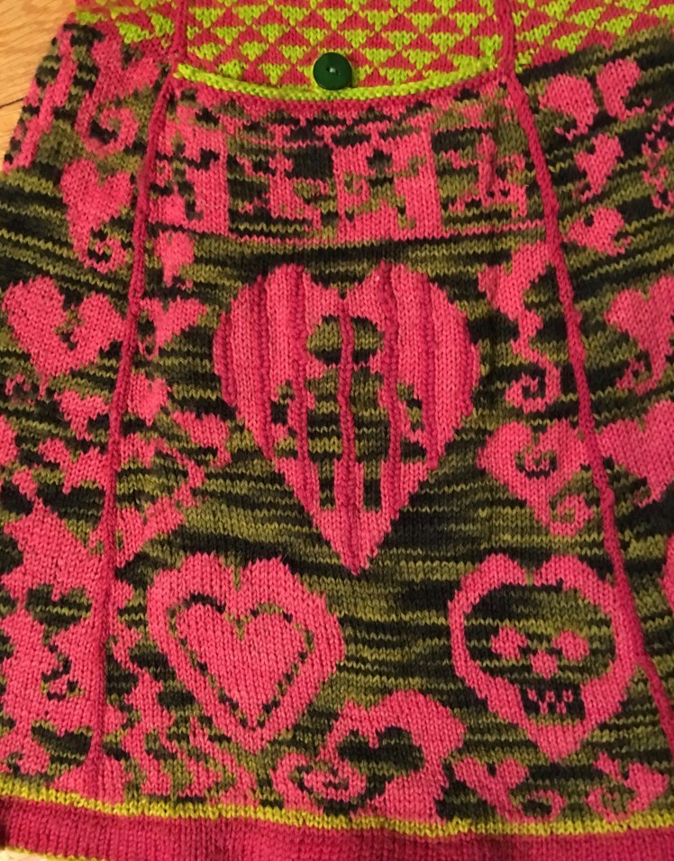 Female bathroom icon inside heart