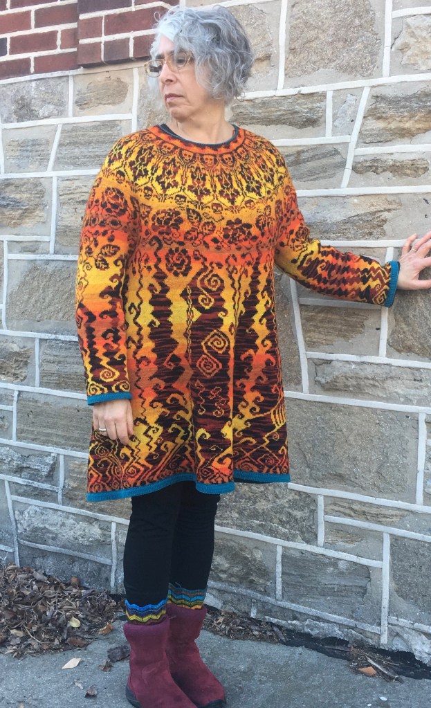 front view of dress incorporating many symbols of societal ideas about the afterlife