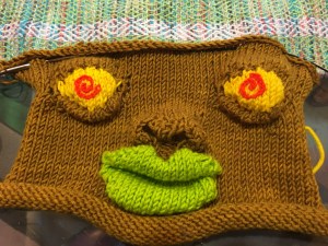 Knitted face designed by Katarina Brieditis