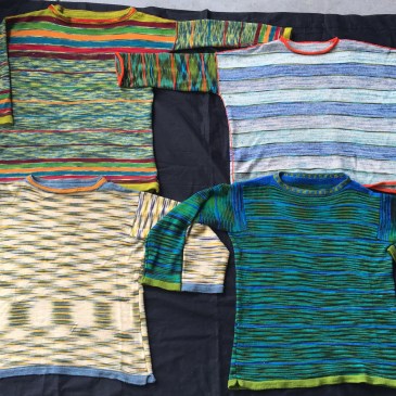 Four machine-knit pullovers