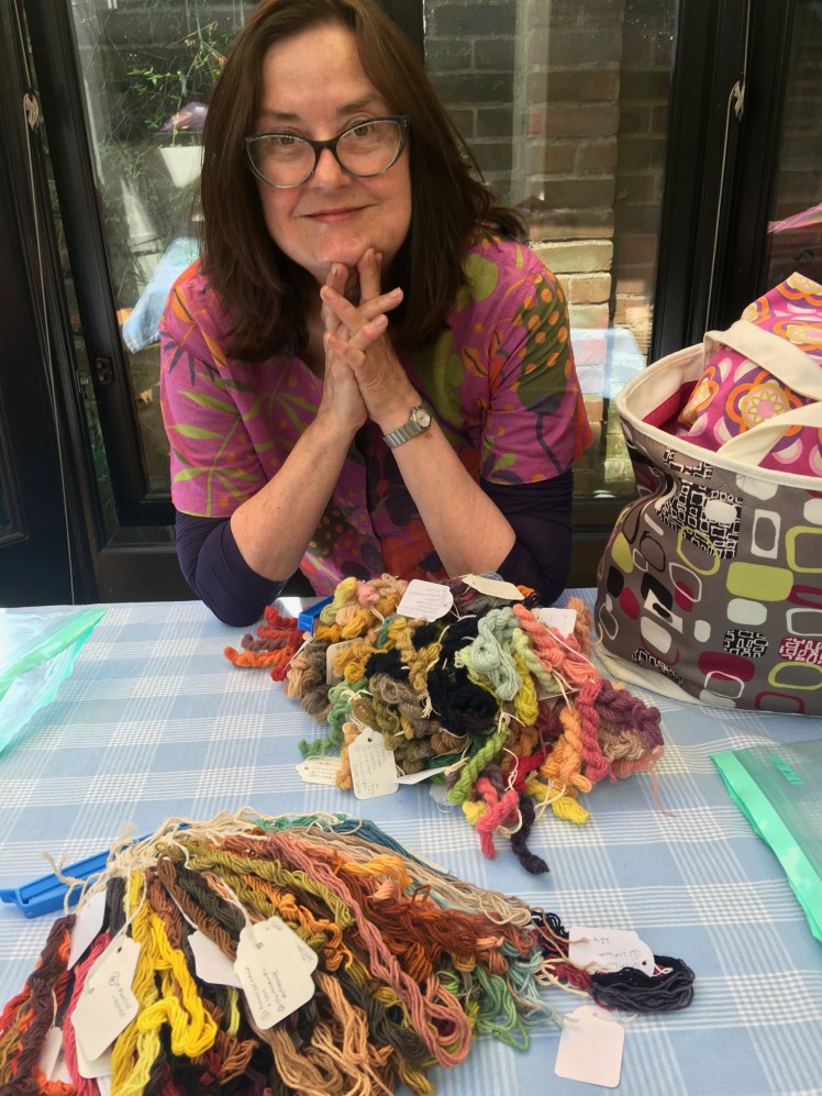 Liz Baltecz and natural-dyed yarn swatches