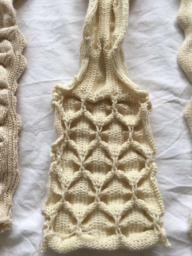 Reverse side of pleated and tucked machine-knit swatch