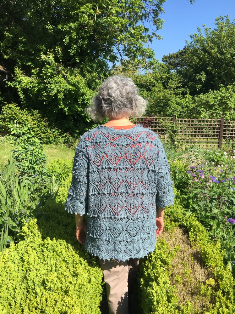 Modeled rear view of pullover with Japanese stitch pattern