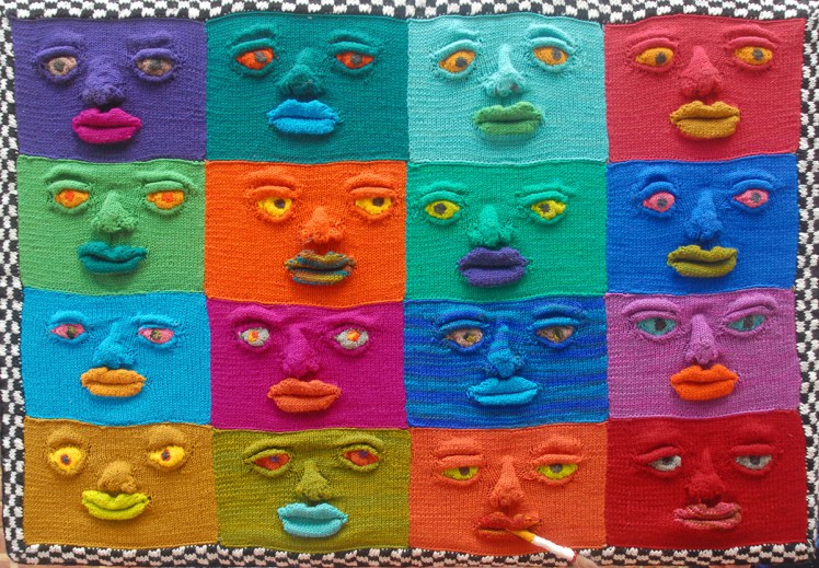 DNA, a wall hanging of knitted faces