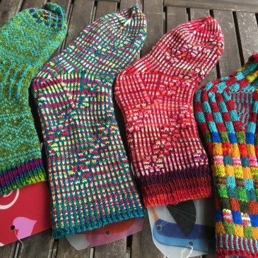 Four different socks made with Strong heel