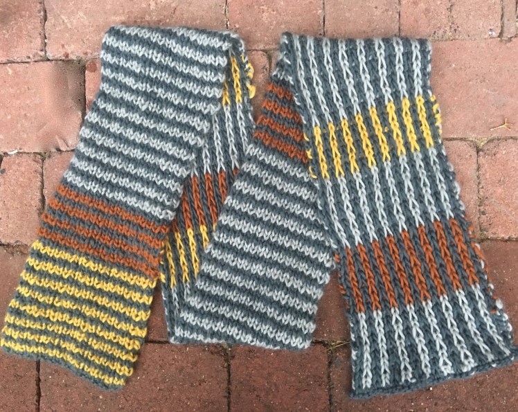 Two-sided knitted scarf, horizontal striping on one side, vertical on the other