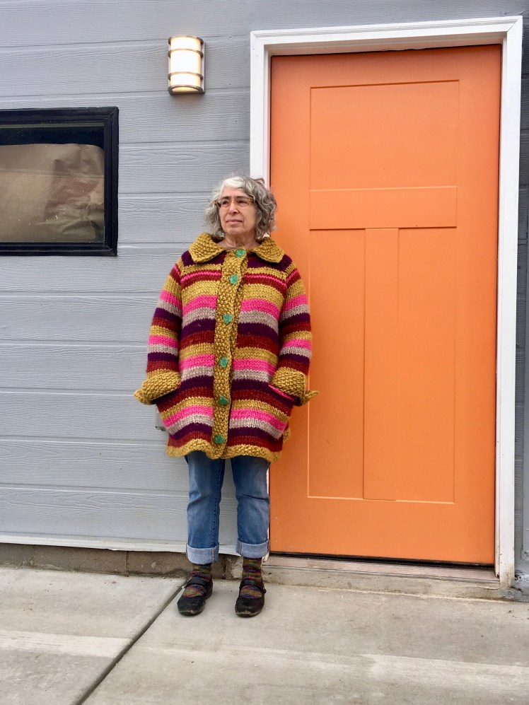 Striped knitted coat with pockets