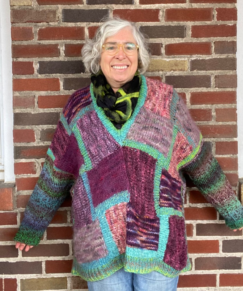 Modeled pullover, front view