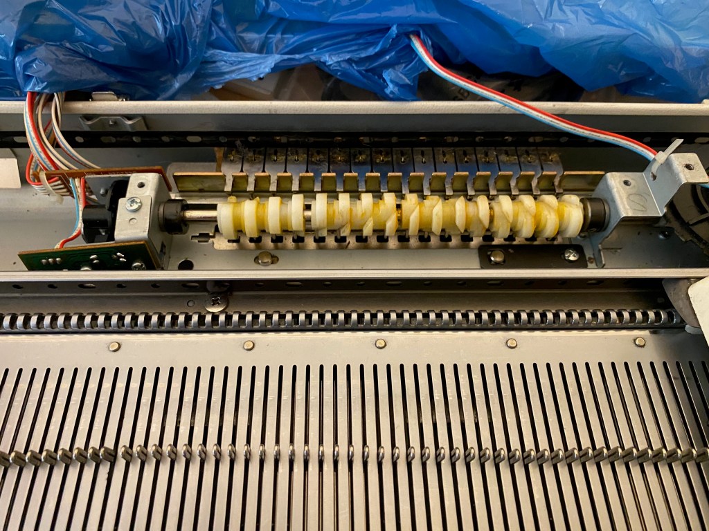 Brother electronic knitting machine needle selection apparatus before cleaning