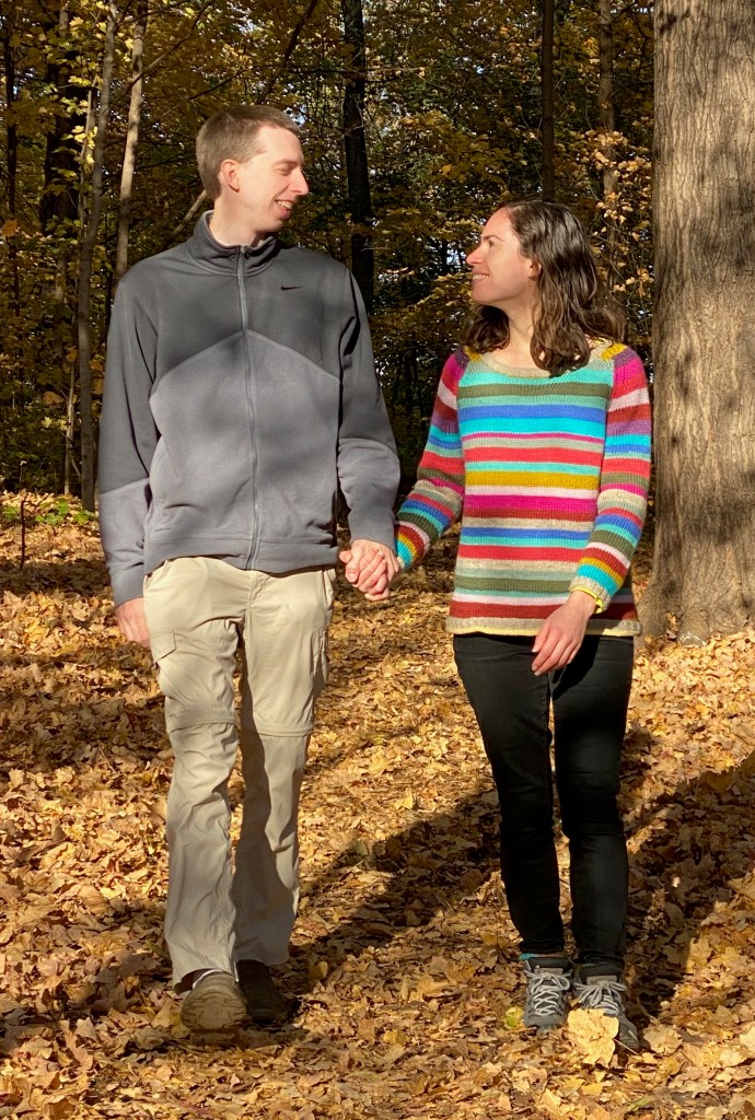 Sweater modeled from front while walking