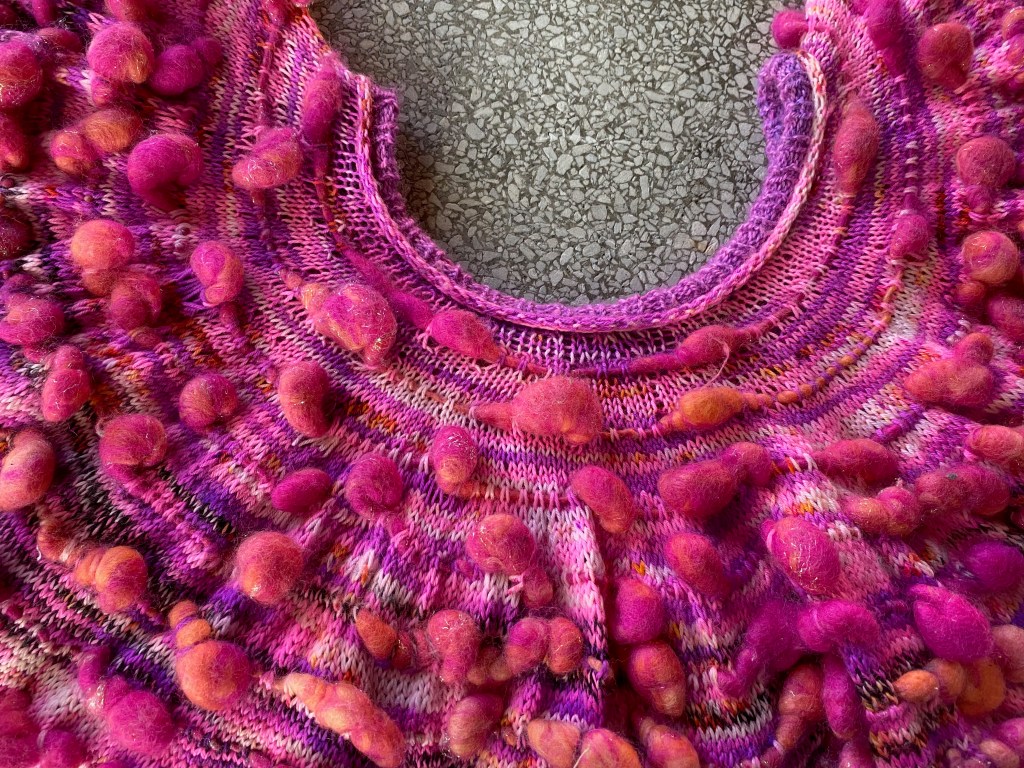 Detail of neck edging and hyperbolic shape of yoke after many increase rows